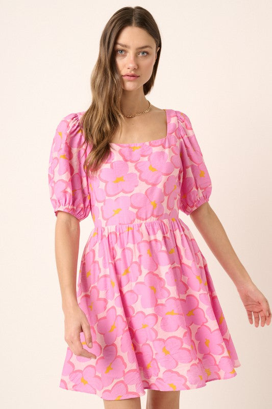 Pink babydoll dress with daisy print