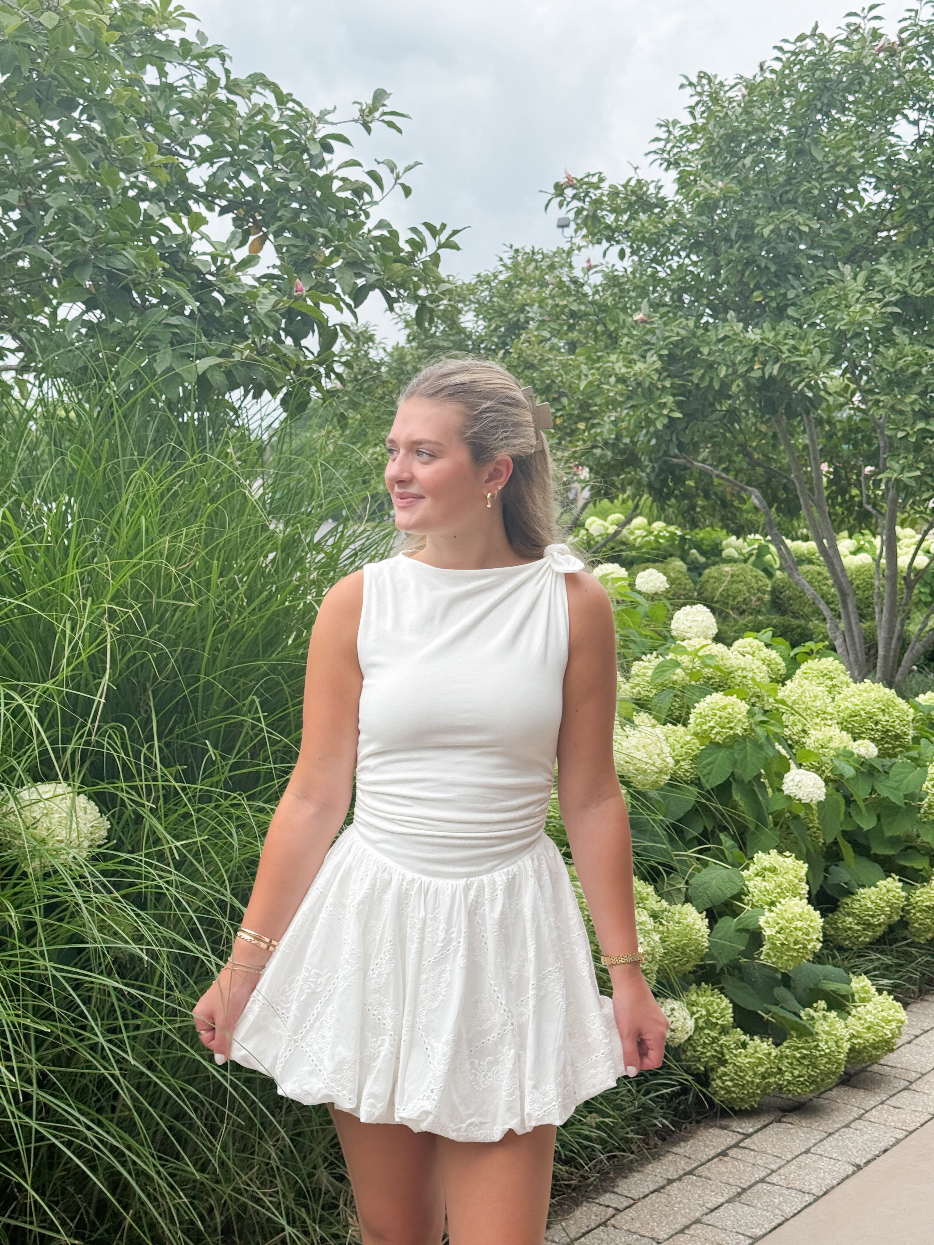 white dress spring Springtime Happiness Eyelet In while intricate lace stockings complete the ensemble Isabel White Bustier Sundress