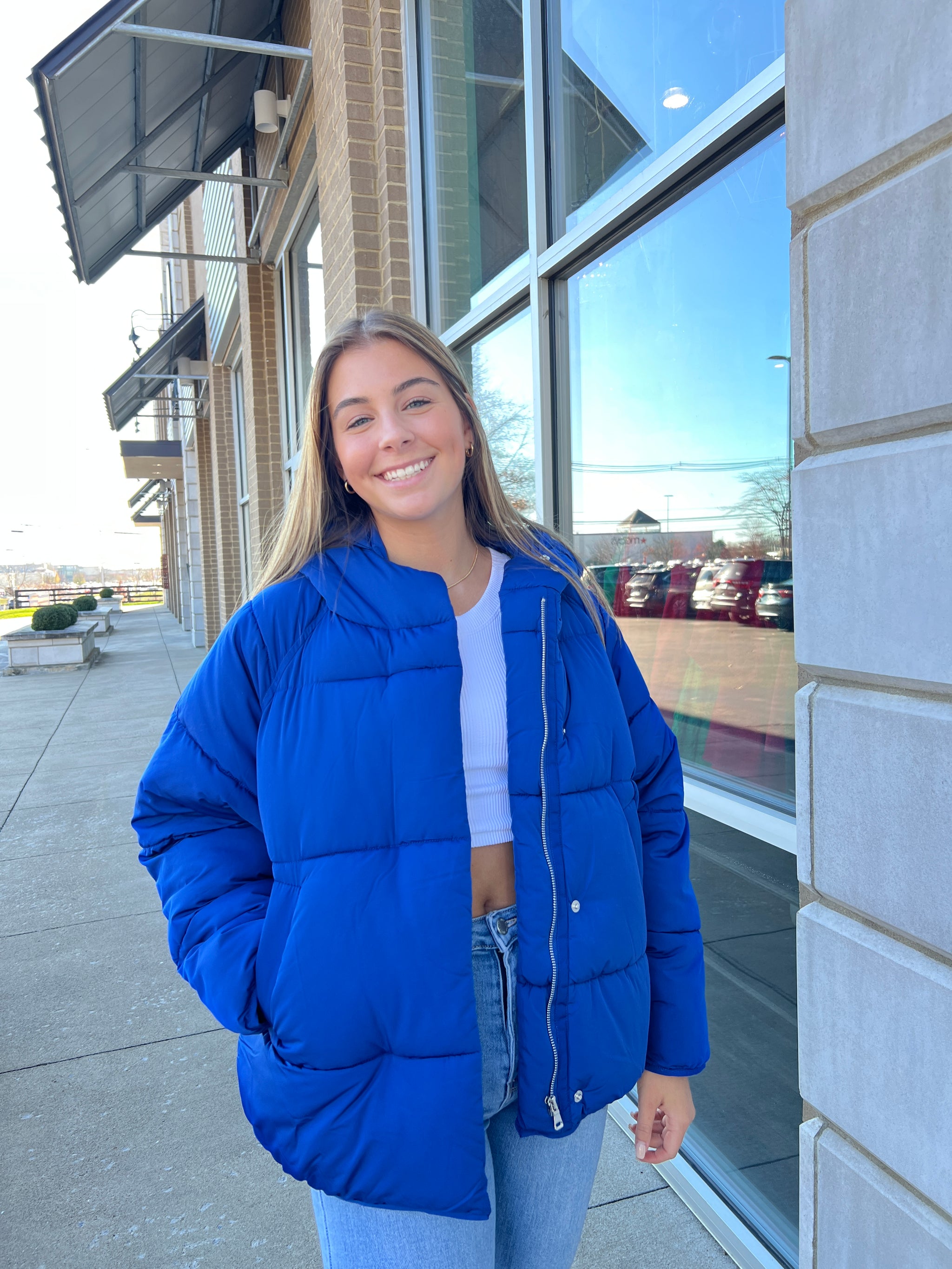 bright blue puffer coat